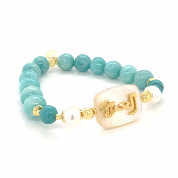 BRACELET IN THE NAME OF AL-JALALAH AL-AZIZ , CRAFTED ON A WHITE SEASHELL WITH PEARLES , TURQUOISE , AMAZONITE .