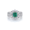 EMERALD GOLD RING 18K STUDDED WITH DIAMONDS . EMERALD GOLD RING 18K STUDDED WITH DIAMONDS .