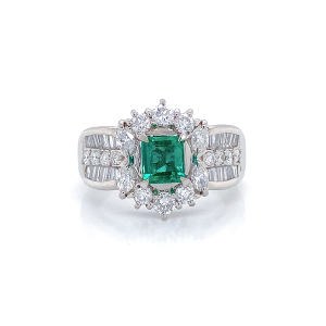 EMERALD GOLD RING 18K STUDDED WITH DIAMONDS .