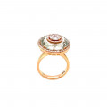 Gold ring studded with diamonds in a round shape with a green Amethyst stone Gold ring studded with diamonds in a round shape with a green Amethyst stone