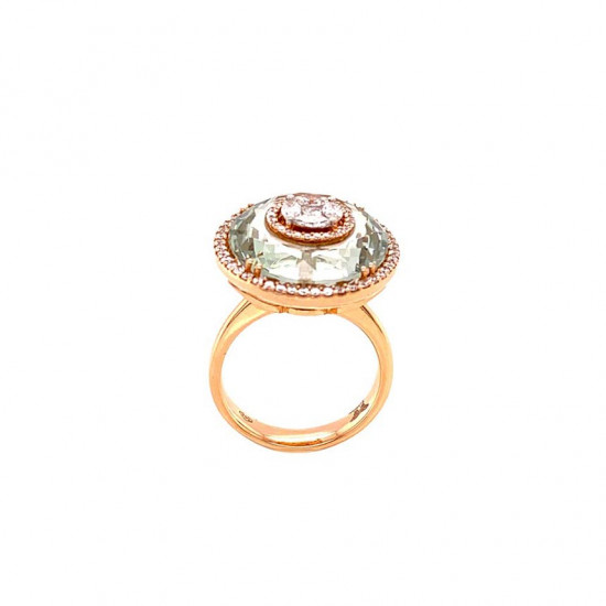 Gold ring studded with diamonds in a round shape with a green Amethyst stone Gold ring studded with diamonds in a round shape with a green Amethyst stone