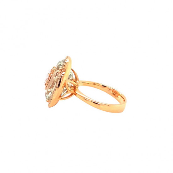 Gold ring studded with diamonds in a round shape with a green Amethyst stone Gold ring studded with diamonds in a round shape with a green Amethyst stone
