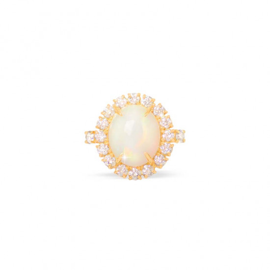 GOLD RING 18K WITH WHITE OPAL STUDDED WITH DIAMONDS .