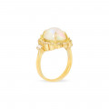 GOLD RING 18K WITH WHITE OPAL STUDDED WITH DIAMONDS .