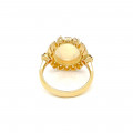 GOLD RING 18K WITH WHITE OPAL STUDDED WITH DIAMONDS .