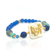 BRACELET IN THE NAME OF AL-JALALAH AL-WAHHAB, WITH IAPIS, TUQUOISE, FLUORITE AND BLUE AGATE .