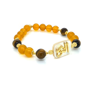 BRACELET IN THE NAME OF AL-JALALAH ( ALNOOR ) CRAFTED ON A WHITE SEASHELL WITH TIGER EYE , YELLOW AGATE