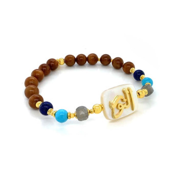 BRACELET IN THE NAME OF AL-JALALAH ( ALNOOR ) WITH Labradorite , TURQUOISE , LAPIS AND COKE WOOD 