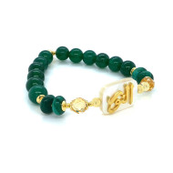 BRACELET IN THE NAME OF AL-JALALAH ( ALNOOR ) CRAFTED ON A WHITE SEASHELL WITH CITRINE , MALACHITE , GREEN JADE