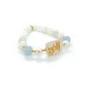 Bracelet in the name of Al-Jalalah alnor, crafted on a white seashell with pearl , aquamarine , and moon stones Bracelet in the name of Al-Jalalah alnor, crafted on a white seashell with pearl , aquamarine , and moon stones