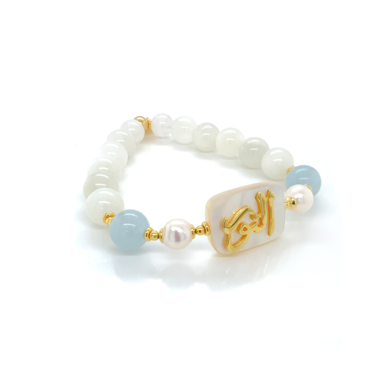 Bracelet in the name of Al-Jalalah alnor, crafted on a white seashell with pearl , aquamarine , and moon stones Bracelet in the name of Al-Jalalah alnor, crafted on a white seashell with pearl , aquamarine , and moon stones