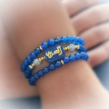 BRACELET IN THE NAME OF AL-JALALAH ALAZEEZ, CRAFTED ON LAPIS WITH AQUAMARINE AND BLUE AGATE