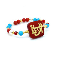 GOLD PLATED BRACELET IN THE NAME OF AL-JALALAH AL-WAHHAB, IN RED AGATE WITH TURQUOISE , RED AGATE , PEARL AND CORAL