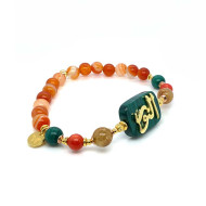 BRACELET IN THE NAME OF ALJALALAH (ALNOOR) ON MALACHITE WITH GOLD THREAD STONE, RED CORAL AND MALACHITE STONES