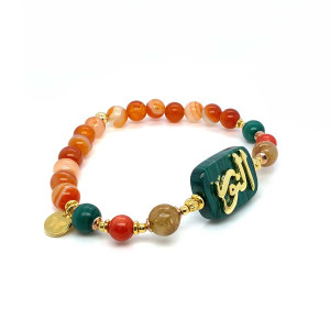 BRACELET IN THE NAME OF ALJALALAH (ALNOOR) ON MALACHITE WITH GOLD THREAD STONE, RED CORAL AND MALACHITE STONES