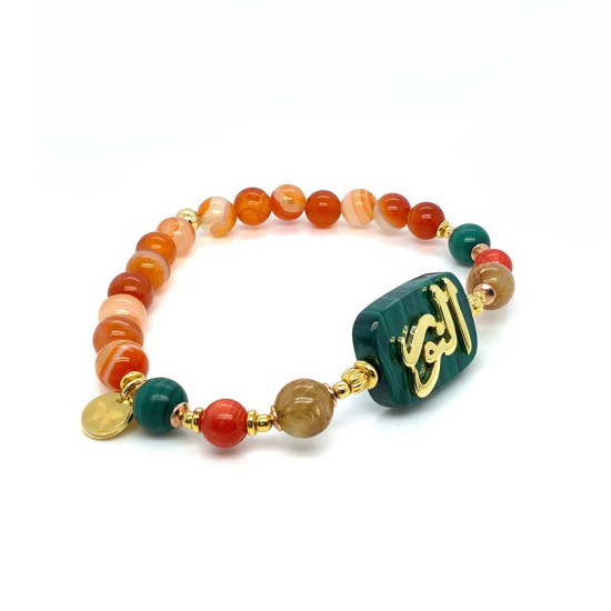 BRACELET IN THE NAME OF ALJALALAH (ALNOOR) ON MALACHITE WITH GOLD THREAD STONE, RED CORAL AND MALACHITE STONES