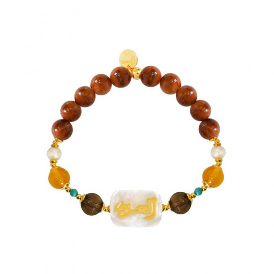 Bracelet in the name of Al-Jalalah Al-Azeez, crafted on a white seashell with Yellow agate, Smoky topaz, Coke wood and pearl Bracelet in the name of Al-Jalalah Al-Azeez, crafted on a white seashell with Yellow agate, Smoky topaz, Coke wood and pearl