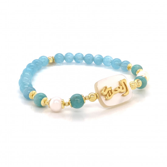 BRACELET IN THE NAME OF AL-JALALAH ALAZEEZ, CRAFTED ON A WHITE SEASHELL WITH amazonite and pearl , aquamarine BRACELET IN THE NAME OF AL-JALALAH ALAZEEZ, CRAFTED ON A WHITE SEASHELL WITH amazonite and pearl , aquamarine