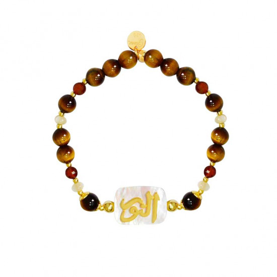 A bracelet in the name of Al-Jalalah Al-Noor, crafted on white seashells, with tiger eyes, brown quartz and seashells A bracelet in the name of Al-Jalalah Al-Noor, crafted on white seashells, with tiger eyes, brown quartz and seashells