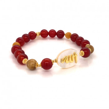 BRACELET IN THE NAME OF AL-JALALAH -ALLA, CRAFTED ON A WHITE SEASHELL WITH Red agate , gold stone and rabbit hair 