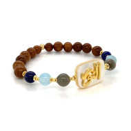 Bracelet in the name of Al-Jalalah alnor, crafted on a white seashell with labrodite, lapis, aquamarine and coke  stones