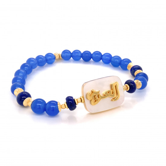 Bracelet in the name of Al-Jalalah alazeez, crafted on a white seashell with blue agate and lapis Bracelet in the name of Al-Jalalah alazeez, crafted on a white seashell with blue agate and lapis