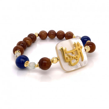 BRACELET IN THE NAME OF AL-JALALAH AL-ALWAHHAB, CRAFTED ON A WHITE SEASHELL WITH cook, fluorite and kyanite