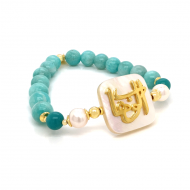 BRACELET IN THE NAME OF AL-JALALAH AL-ALWAHHAB, CRAFTED ON A WHITE SEASHELL WITH PEARLES , TURQUOISE , AMAZONITE .