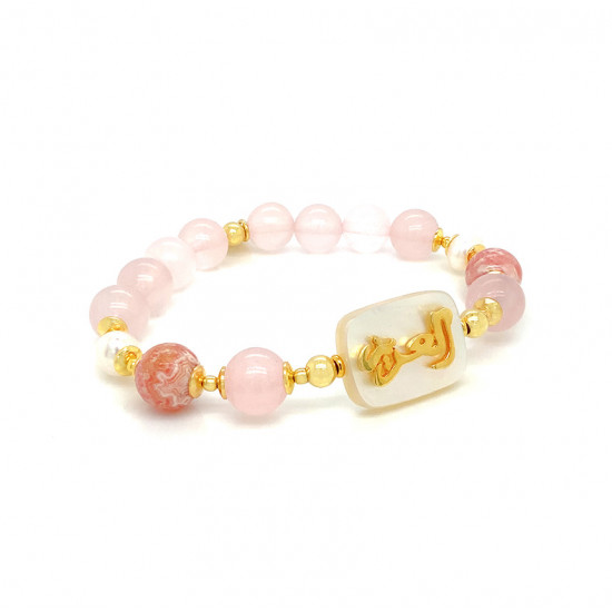 BRACELET IN THE NAME OF AL-JALALAH ALAZEEZ, CRAFTED ON A WHITE SEASHELL WITH PINK QUARTZ , ROHODOCHROSITE AND PEARL BRACELET IN THE NAME OF AL-JALALAH ALAZEEZ, CRAFTED ON A WHITE SEASHELL WITH PINK QUARTZ , ROHODOCHROSITE AND PEARL