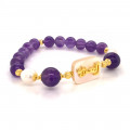 BRACELET IN THE NAME OF AL-JALALAH ALAZEEZ, CRAFTED ON A WHITE SEASHELL WITH Amethyst and pearl BRACELET IN THE NAME OF AL-JALALAH ALAZEEZ, CRAFTED ON A WHITE SEASHELL WITH Amethyst and pearl