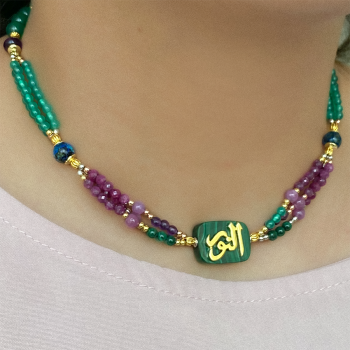A MALACHITE STONE NECKLACE, HANDCRAFTED WITH THE NAME OF HIS MAJESTY (AL-NOOR), WITH RUBI , AZURITE , AMETHYST AND GREEN AGATE 18K GOLD PLATED.