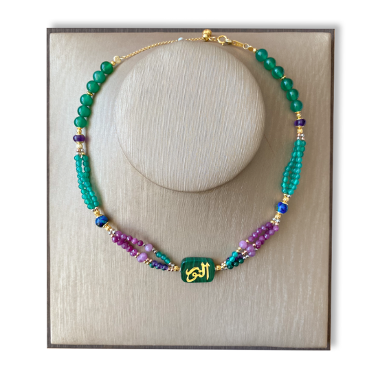 A MALACHITE STONE NECKLACE, HANDCRAFTED WITH THE NAME OF HIS MAJESTY (AL-NOOR), WITH RUBI , AZURITE , AMETHYST AND GREEN AGATE 18K GOLD PLATED. A MALACHITE STONE NECKLACE, HANDCRAFTED WITH THE NAME OF HIS MAJESTY (AL-NOOR), WITH RUBI , AZURITE , AMETHYST AND GREEN AGATE 18K GOLD PLATED.