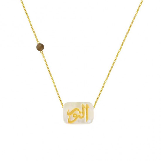 A silver chain in the name of Al-Jalalah Al-Noor, crafted on a white seashell with a Laprodite stone A silver chain in the name of Al-Jalalah Al-Noor, crafted on a white seashell with a Laprodite stone