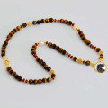 HORSE SEASHELL NECKLACE WITH TIGER EYE STONE, RED AGATE, PEARL, AND CITRINE STONE