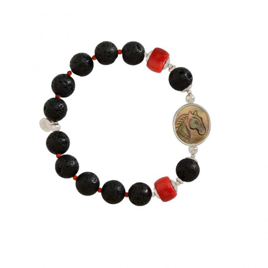A horse seashell with a volcanic stone, a red coral stone, and a red agate stone A horse seashell with a volcanic stone, a red coral stone, and a red agate stone
