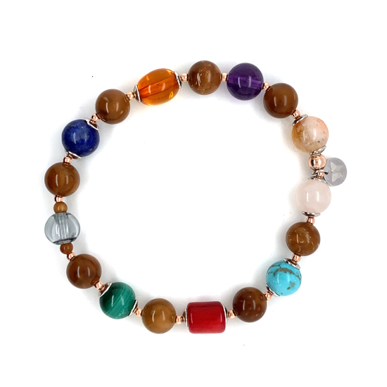 Aromatic royal chakras bracelet with ( Pink Quartz , Turquoise , Amber , Lapis , Malachite , red Coral , Amethyst , Citrine ) Aromatic royal chakras bracelet with ( Pink Quartz , Turquoise , Amber , Lapis , Malachite , red Coral , Amethyst , Citrine )