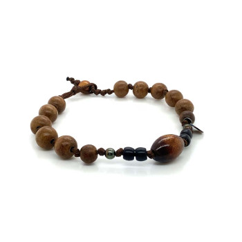 STRING BRACELET WITH GOLDEN CORAL, COCONUT WOOD, AND AGARWOOD