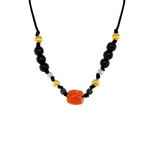 Coral necklace with black coke wood .
