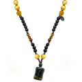GOLD TIGEREYE NECKLACE WITH BLACK WOOD COKE AND AMBER