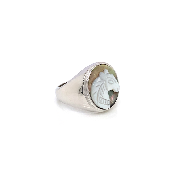 White silver sea-shell horse ring on black seashell crated in deferent colors White silver sea-shell horse ring on black seashell crated in deferent colors