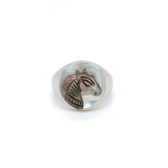 Black silver sea-shell horse ring on white seashell crated in deferent colors Black silver sea-shell horse ring on white seashell crated in deferent colors