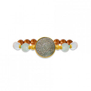 Silver Bracelet made of Saudi prominent black pound seashell with Aquamarine, crystal, pink quartz, turquoise and coke wood