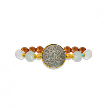 Silver Bracelet made of Saudi prominent black pound seashell with Aquamarine, crystal, pink quartz, turquoise and coke wood