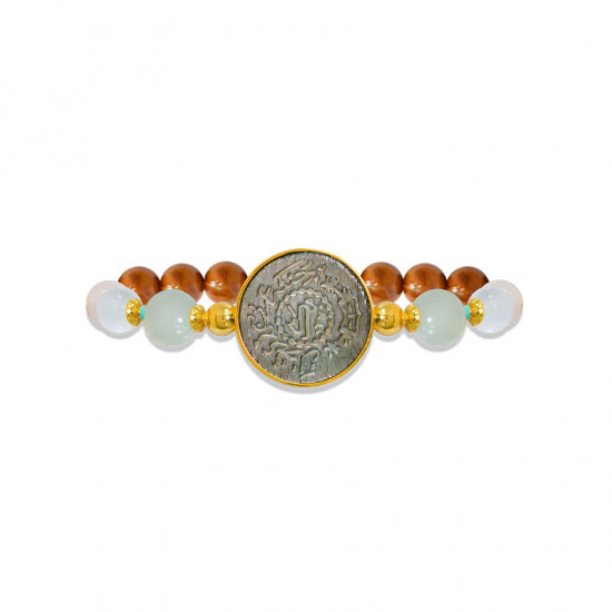 Silver Bracelet made of Saudi prominent black pound seashell with Aquamarine, crystal, pink quartz, turquoise and coke wood Silver Bracelet made of Saudi prominent black pound seashell with Aquamarine, crystal, pink quartz, turquoise and coke wood