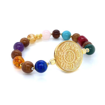 Silver Bracelet made of Saudi prominent black pound shell with shakirat stones ( Malachite , red coral , turquoise , pink quartz , citrine , amythest , amber , lapis and cook wood )