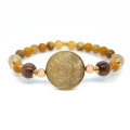 BRACELET ON SAUDI JENNEH SHELL WITH GOLD THREAD STONE AND RABBIT HAIR STONE