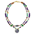 A NECKLACE MADE OF SAUDI POUND SHELL WITH TOURMALLINE , AMETHYST, GREEN AGATE AND AMACITRINE 