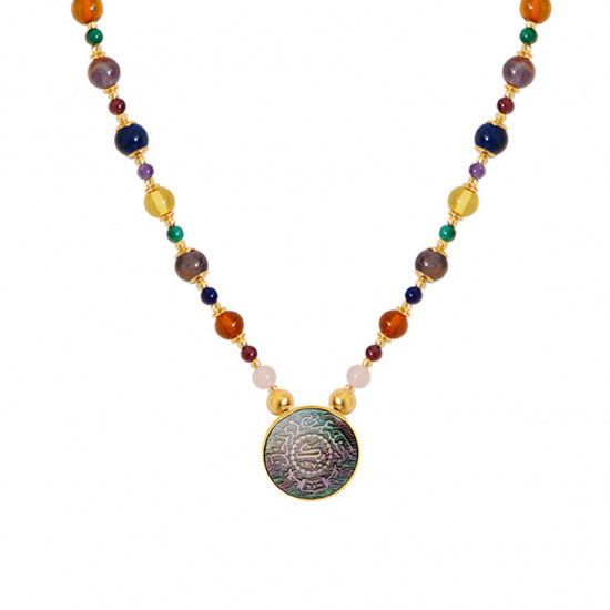 A NECKLACE MADE OF SAUDI GOLD POUND SHELL WITH pink quartz, garnet, amber, amastrin, malachite and lapis A NECKLACE MADE OF SAUDI GOLD POUND SHELL WITH pink quartz, garnet, amber, amastrin, malachite and lapis