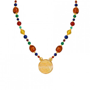A NECKLACE MADE OF SAUDI GOLD POUND SHELL WITH red AGATE , YELLOW AGATE , lapis, amber, green AGATE and garnet with amber musk