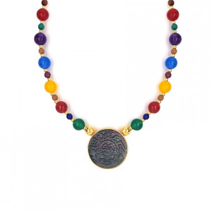 A necklace made of Saudi  pound shell with colored agate , amethyst, pink quartz, coral, malachite, garnet stones, lapis, and Coke
